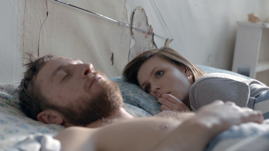 ELLEN IS LEAVING -Ellen (Tai Berdinner Blades) watches her boyfriend, Hamish, sleep